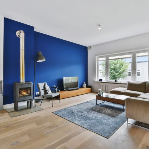 Beautiful living room with a large sofa and fireplace